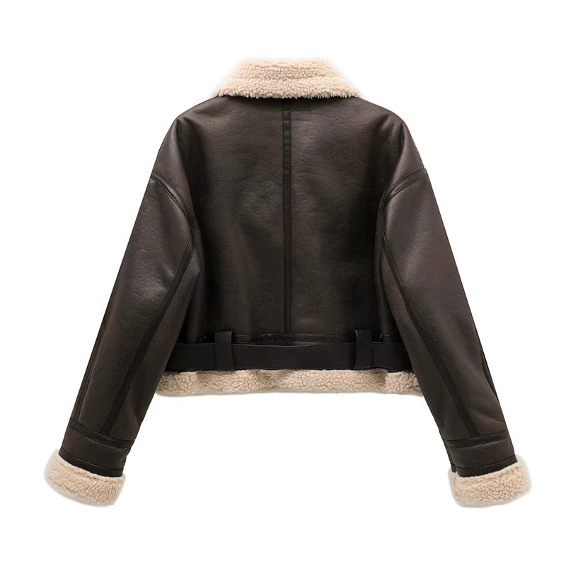 Women's leather winter jacket with vintage design and adjustable belt.